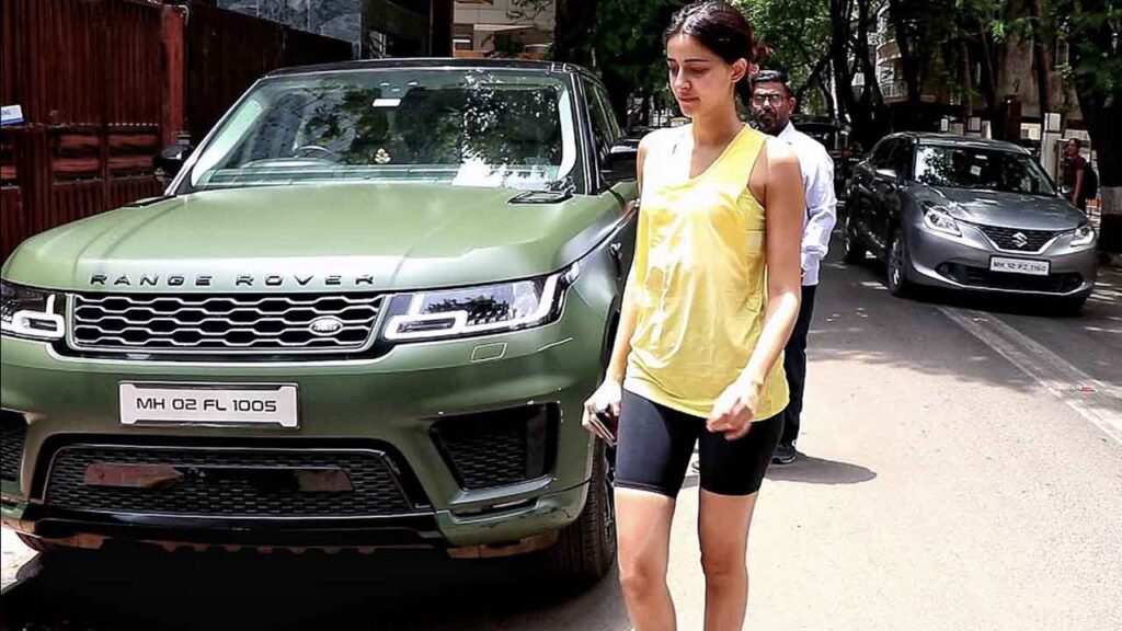Ananya Panday posing with Range Rover Sport